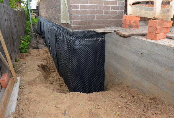 SJ Waterproofing Pros technician performing targeted Sump Pump Installation assessment in Celina, OH